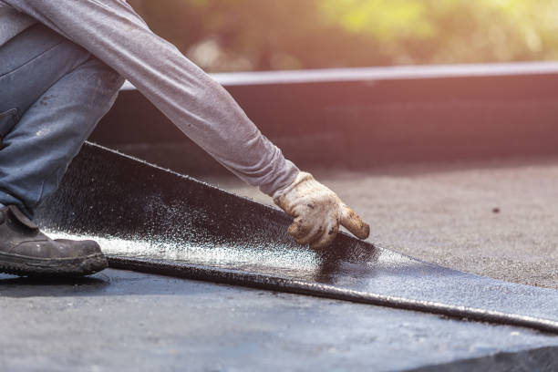 Professional Emergency Waterproofing technician working in Hudsonville, MI